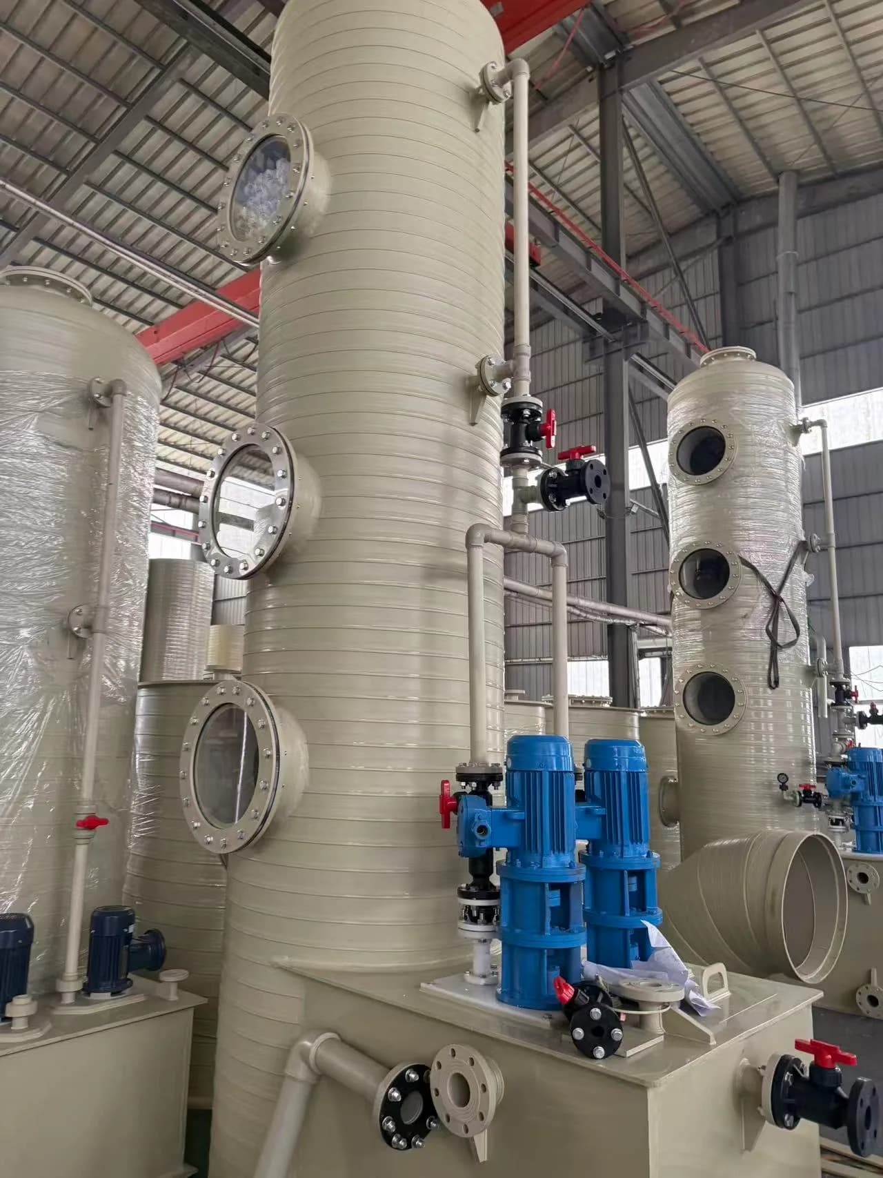 Fabricated plastic process equipment with pipe connections in the Xin Longdi workshop