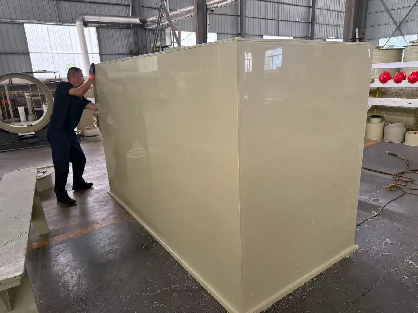 Large rectangular plastic tank structure under fabrication in the Xin Longdi workshop